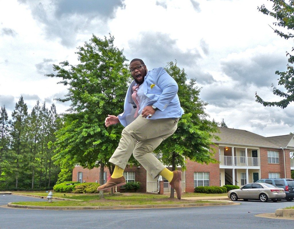 Leaping Big Man In Suit